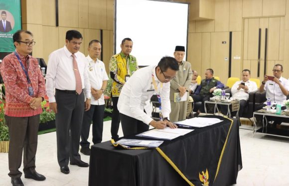 Bupati Musa Ahmad Teken MoU dengan PT Taspen pada Bimtek OSS dan LKPM yang Digelar DPMPST Lamteng