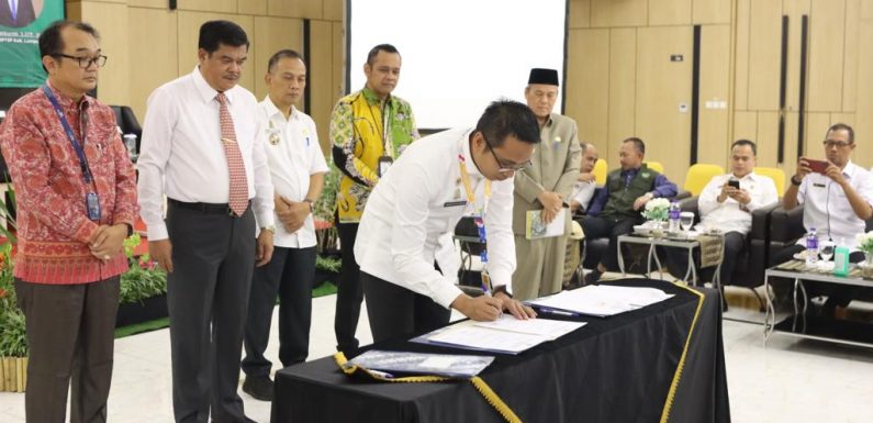 Bupati Musa Ahmad Teken MoU dengan PT Taspen pada Bimtek OSS dan LKPM yang Digelar DPMPST Lamteng