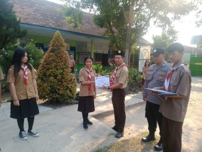 Hari Pramuka ke 62, Lurah Bandarjaya Barat Ahmad Sopan Musa Berikan Pembinaan di SMP 2 Kristen